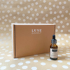 Vielle Serum with 'LOVE GOODLY' bx branding against a polka dot background